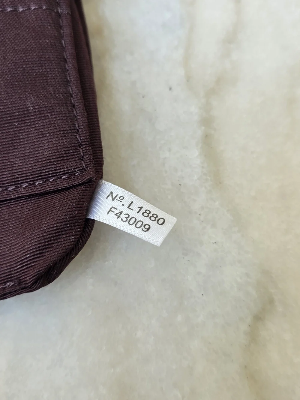 COACH Dempsey Large Corner Zip Wristlet Signature Jacquard Stripe
